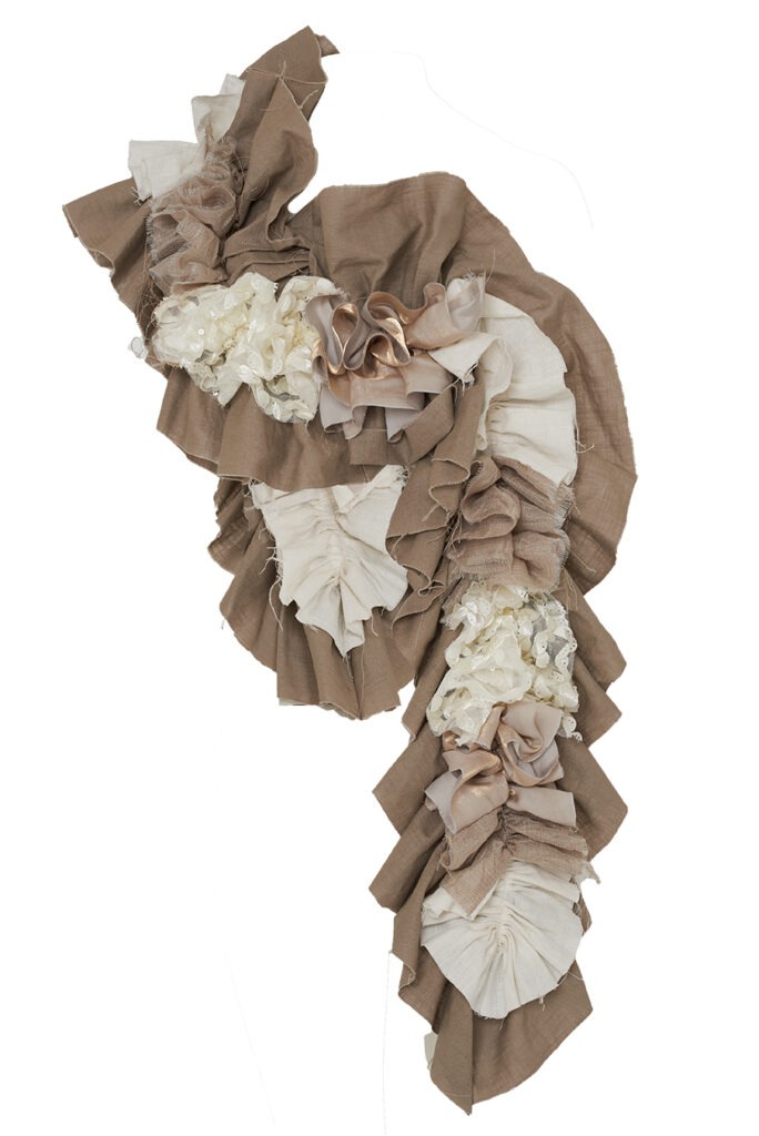 Tied Ends fashion photography - model wearing upcycled clothing with beautiful ruffles and texture